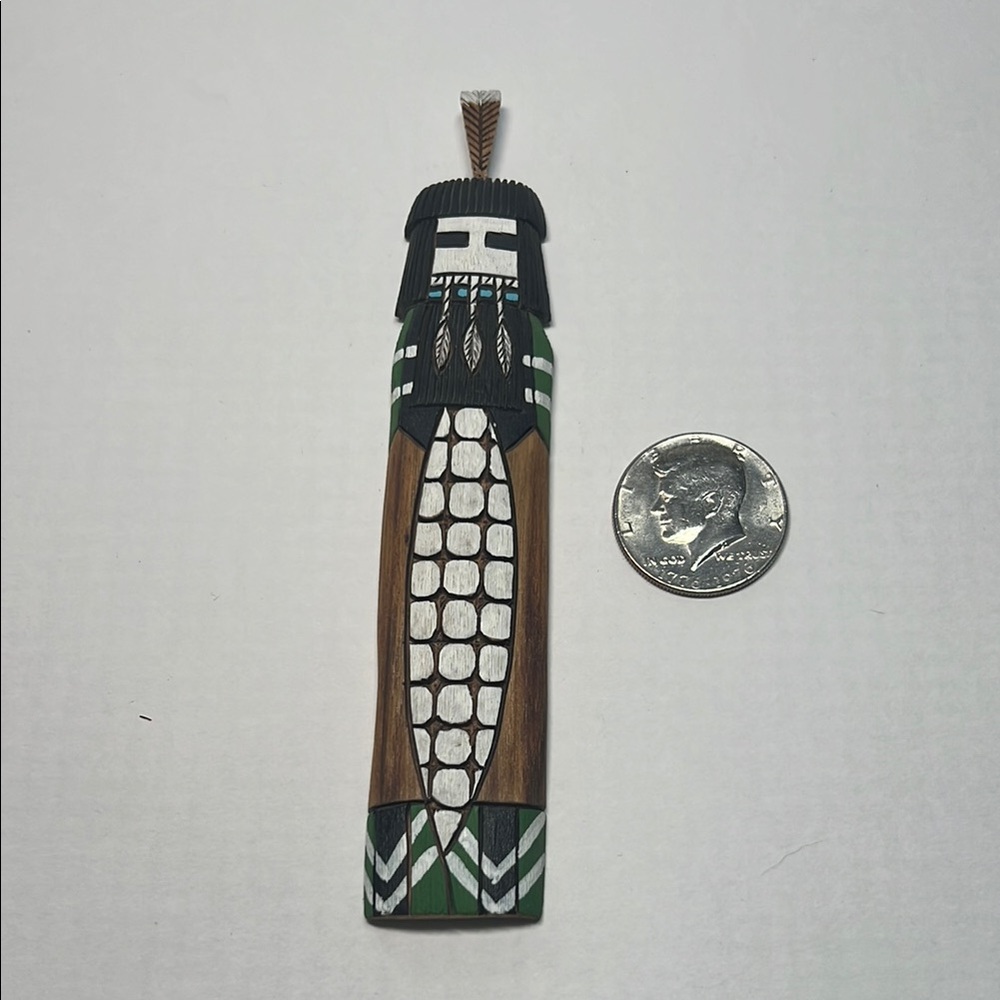 Handcrafted Wooden Kachina magnet.